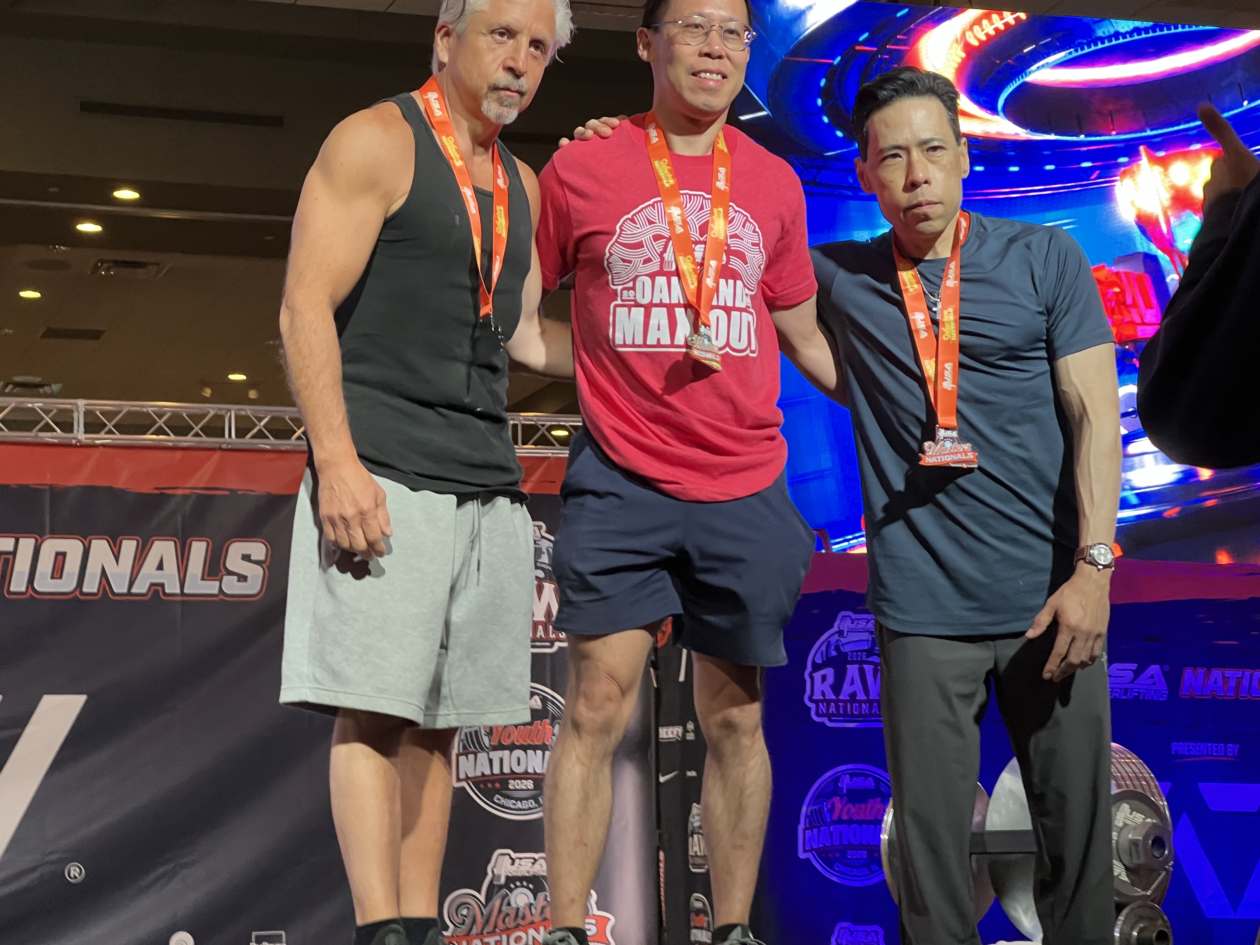 Roland Dong with fellow competitors at USA Powerlifting Masters Nationals